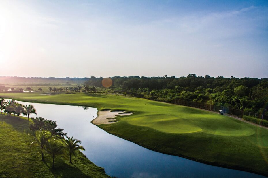 Fairway and lake at first light at a Panama golf resort: to choose a golf tour company, watch how it handles tee times before they are confirmed