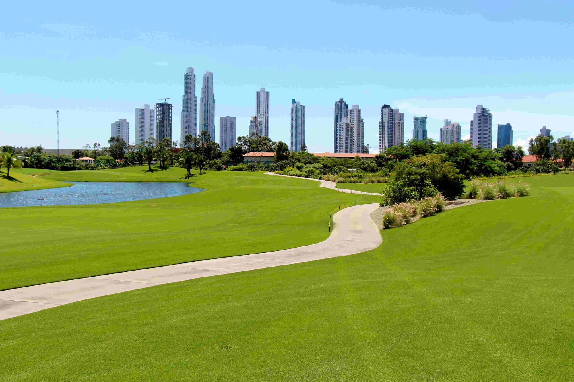 Fairway at The Santa María with the Panama City skyline behind, the urban course in play when quoting a golf group in Panama
